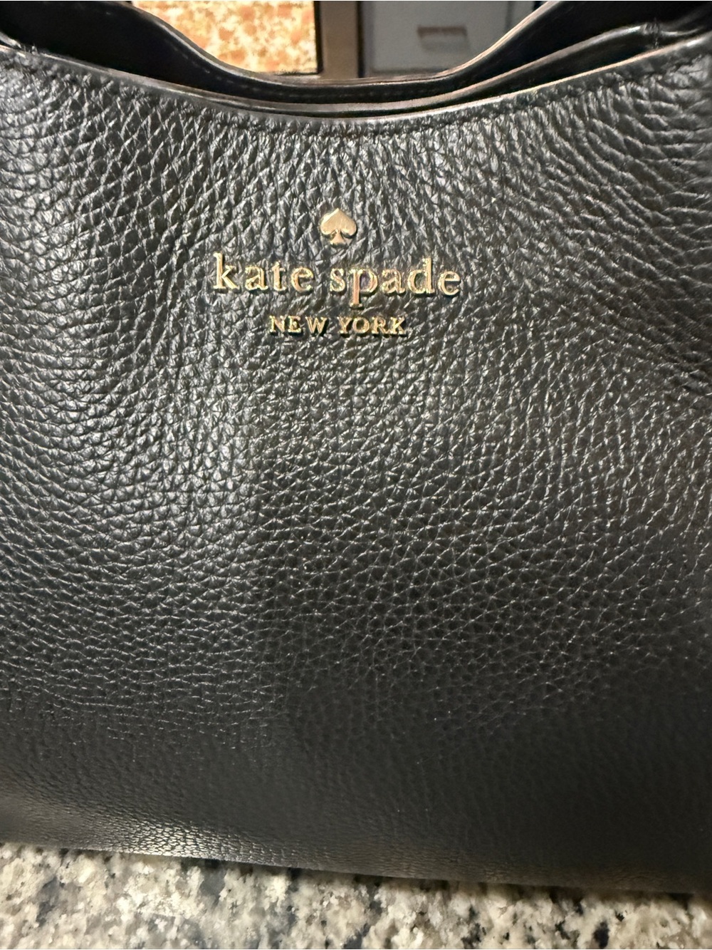 kate spade black pebbled leather shoulder bag with gold logo